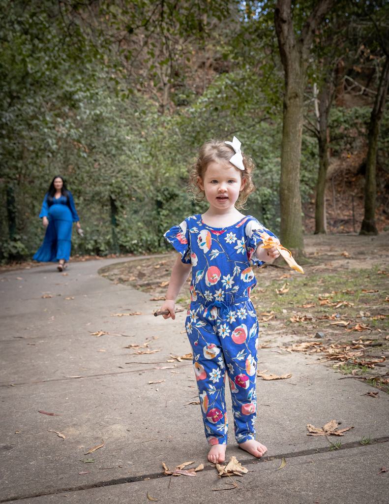 Little girl running in the park
