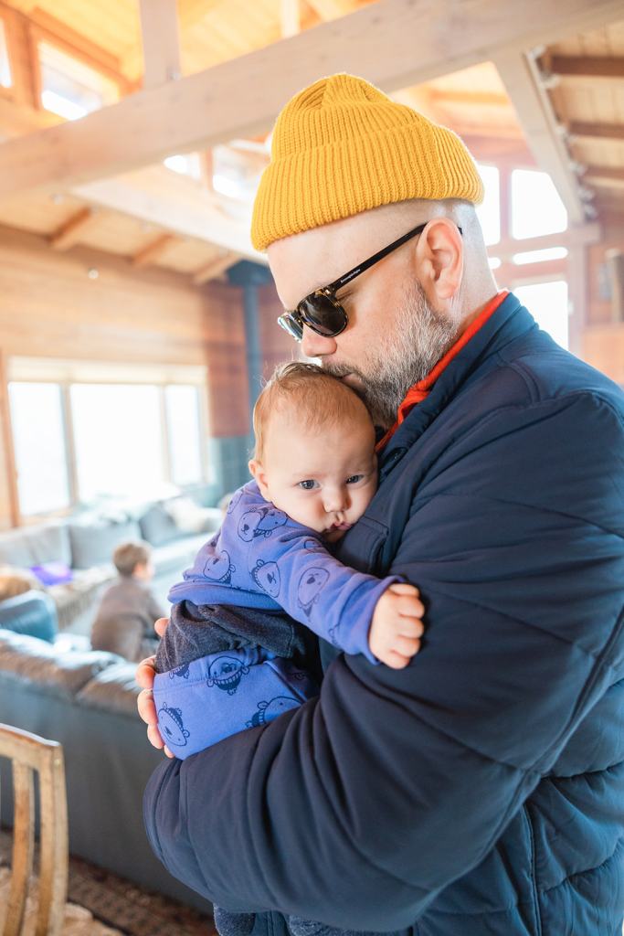 Father holding his child during extended family photoshoot in West California Marin County