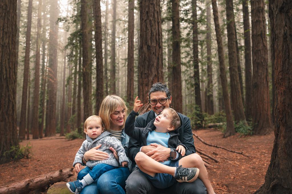 Family posing for photos during Redwood Oakland Park family session