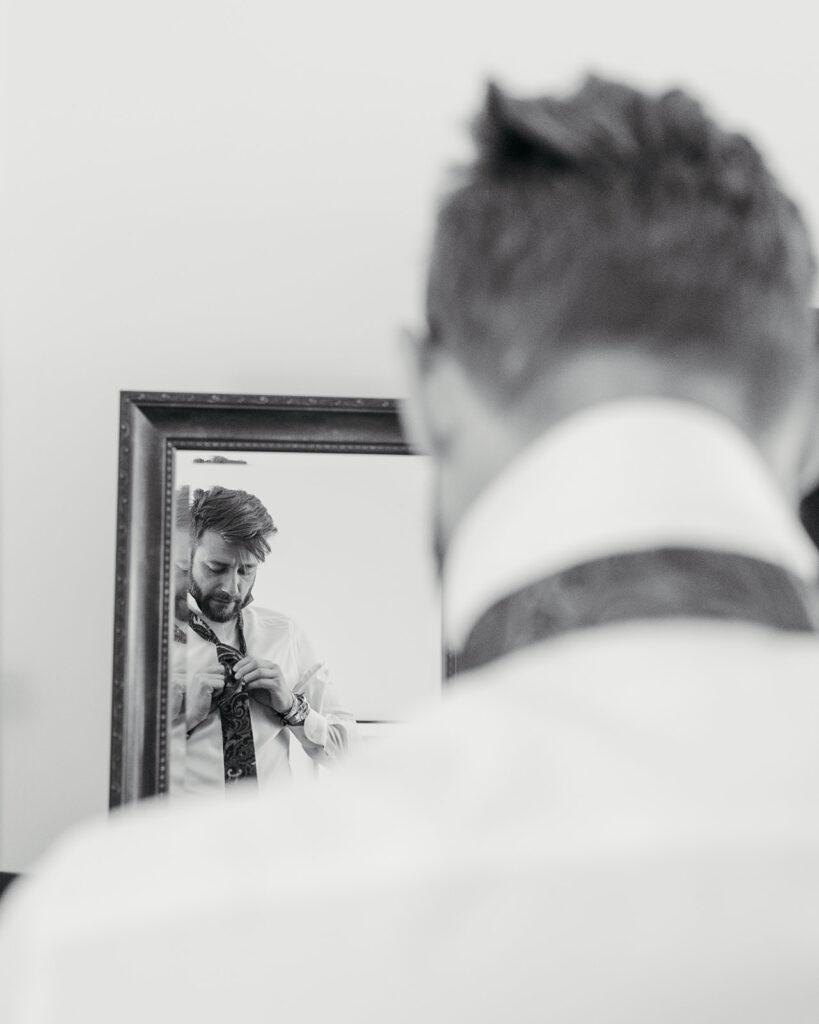 Groom getting ready for ceremony