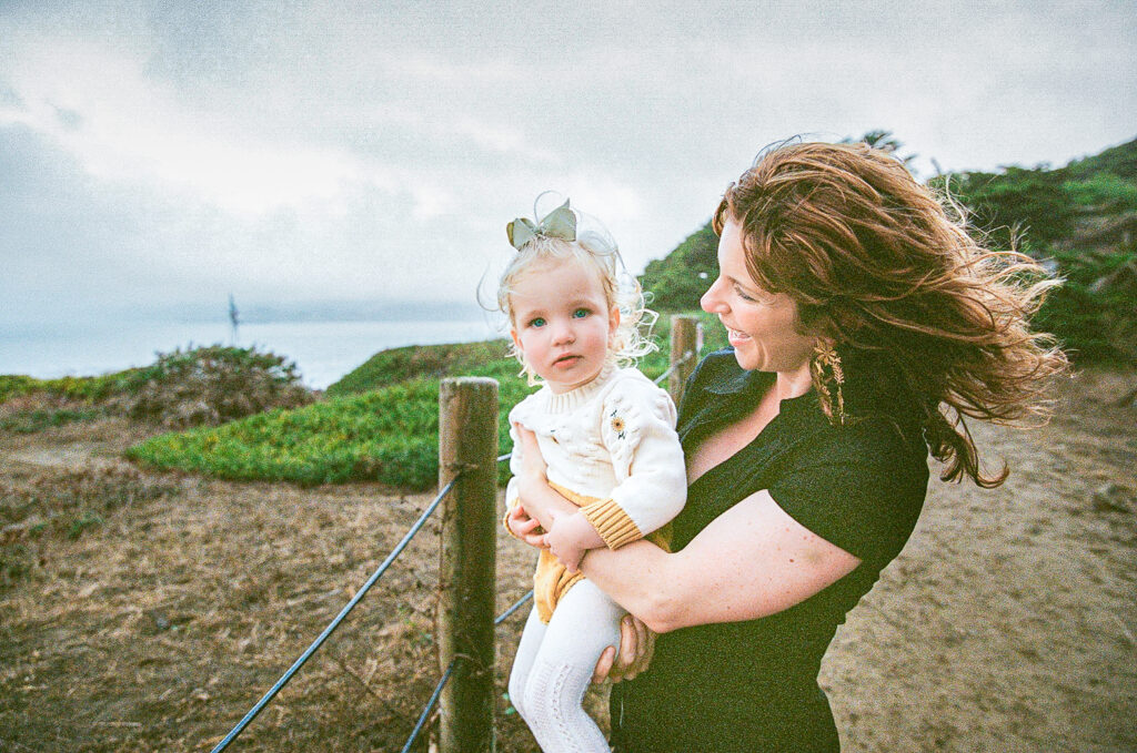 Mother holding daughter on 35mm film