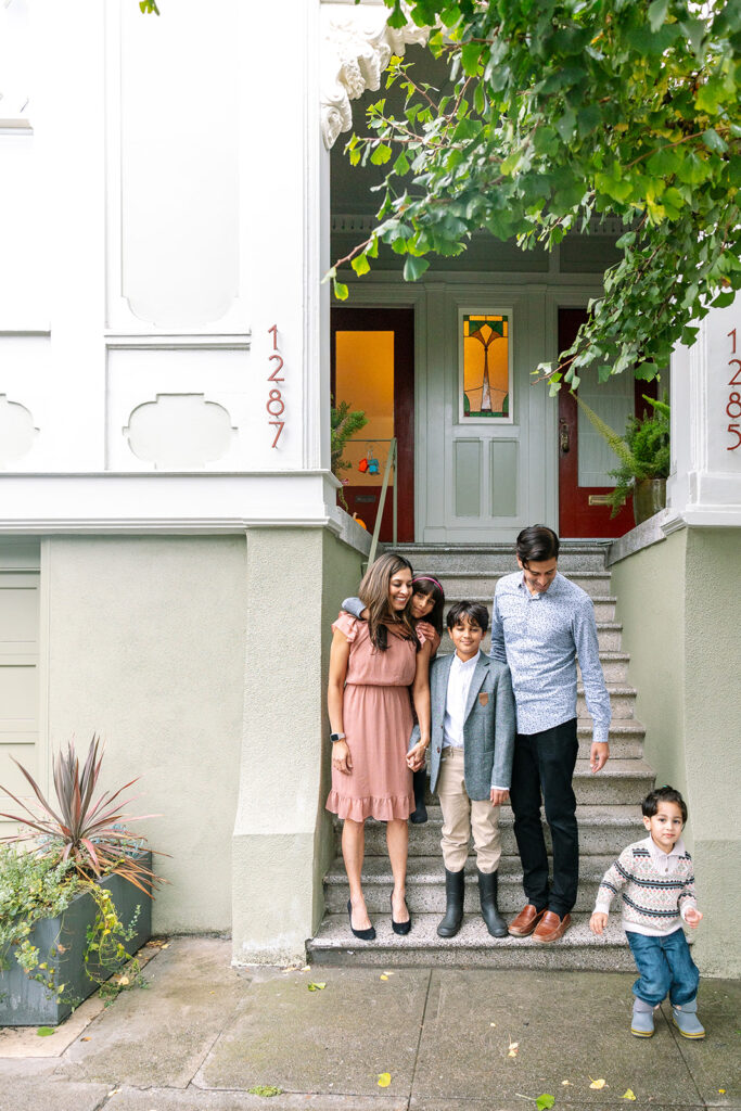 Family standing outside of their house for a family photoshoot in San Francisco