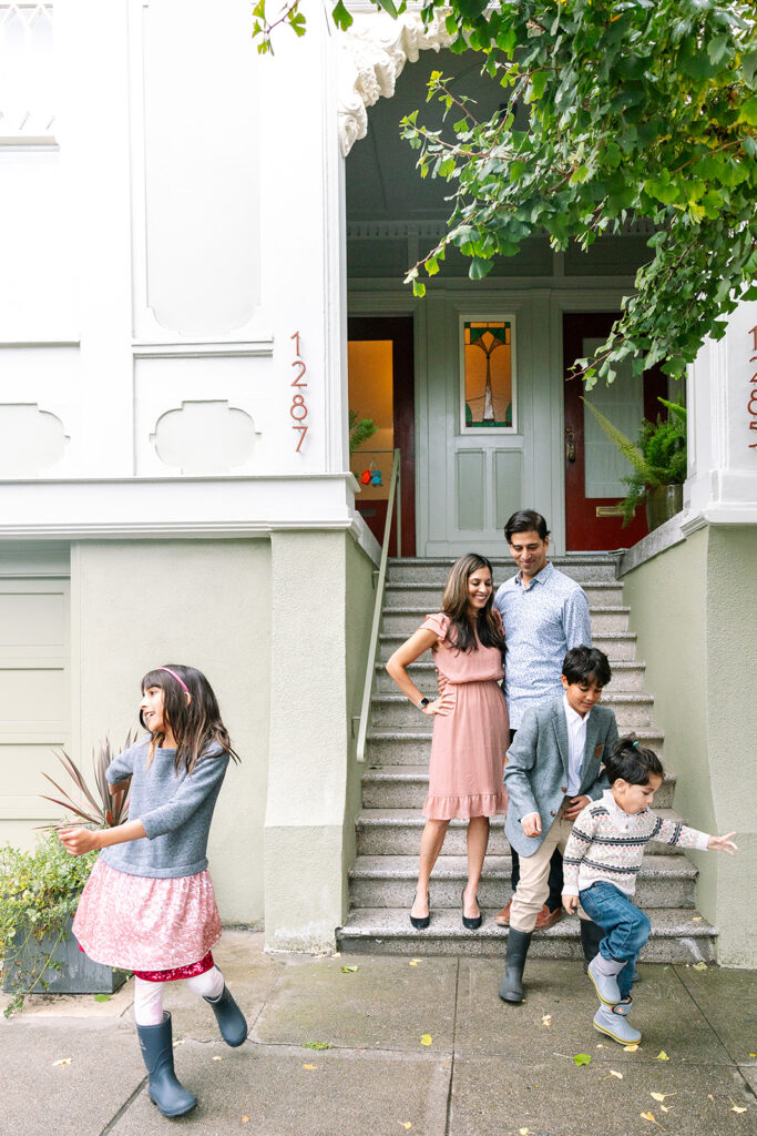 Family standing outside of their house for a family photoshoot in San Francisco