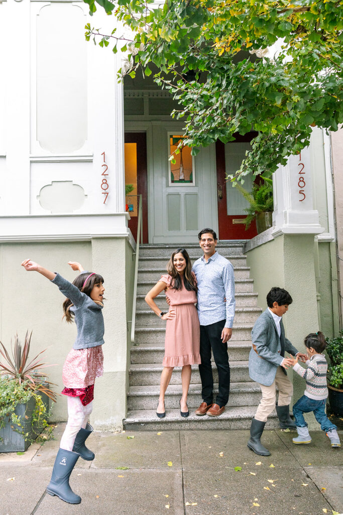 Family standing outside of their house for a family photoshoot in San Francisco