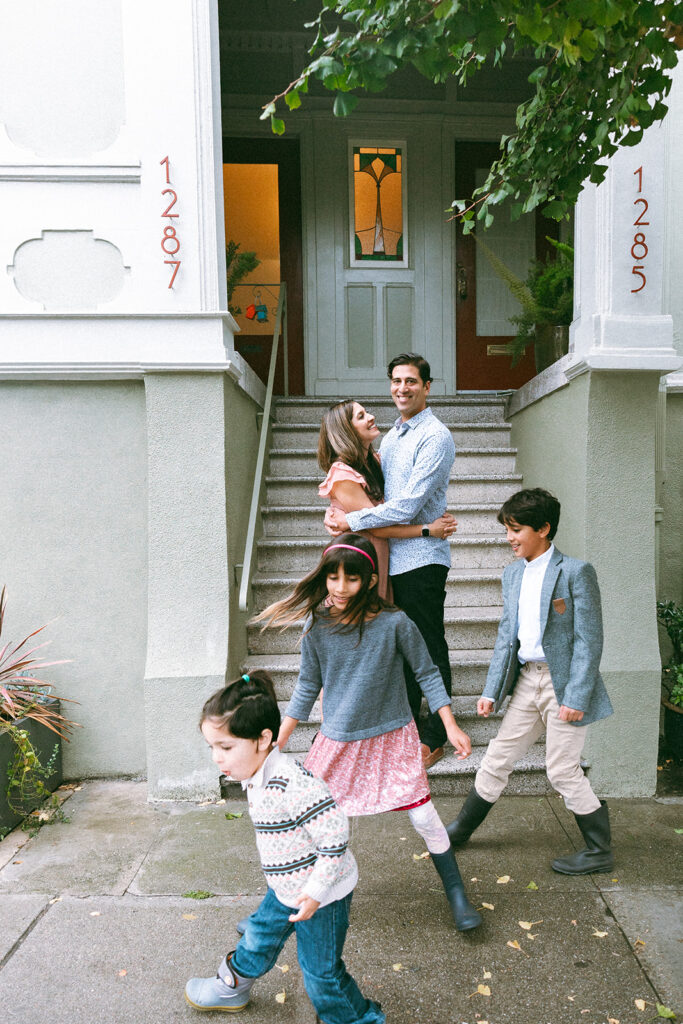 Family standing outside of their house for a family photoshoot in San Francisco