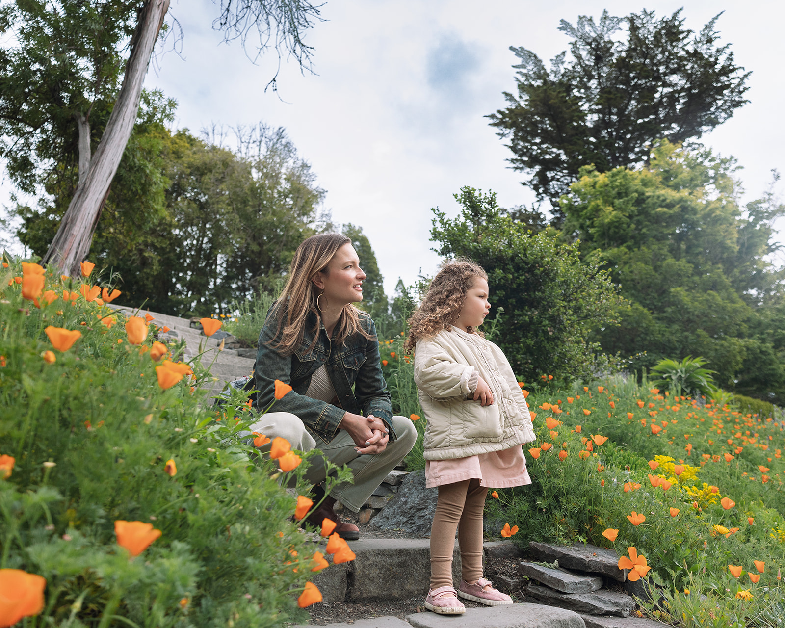 Mother and daughter enjoying the flowers at Blake Garden in Kensington - Top East Bay Area Photography Locations For Family Photos 