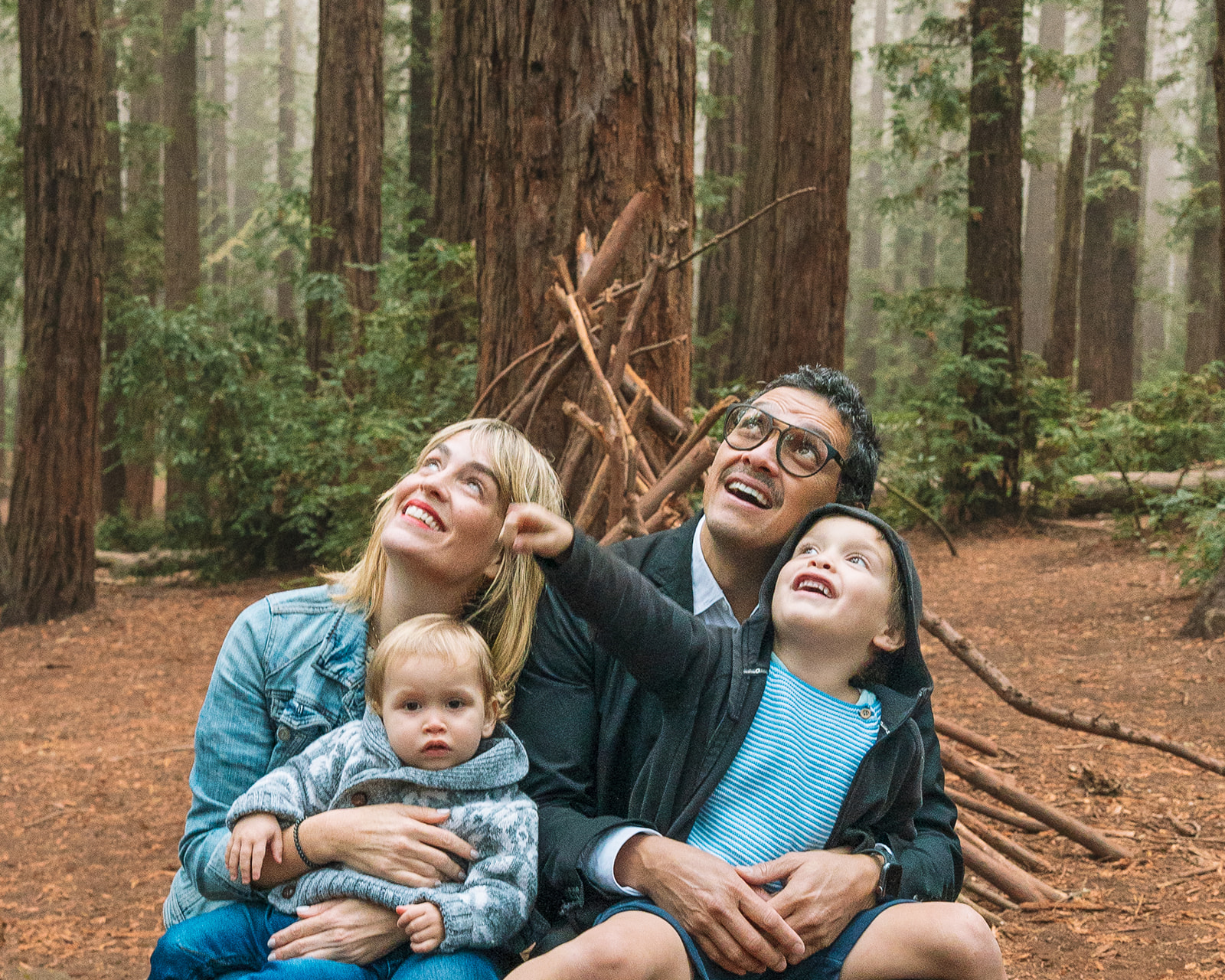 Family of four enjoying the redwoods at Redwood Regional Park/Joaquin Miller Park in Oakland, California  - Top East Bay Area Photography Locations For Family Photos 