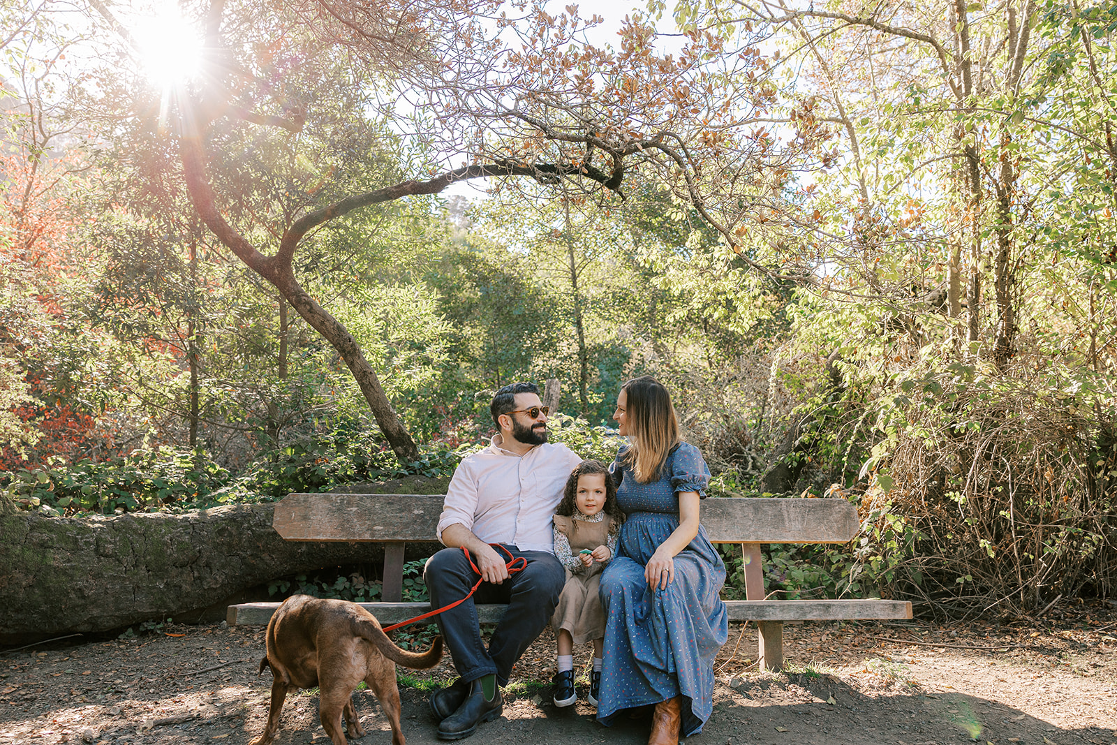 Little girl and her parents at Tilden Regional Park in Berkeley, CA for their maternity & family pictures