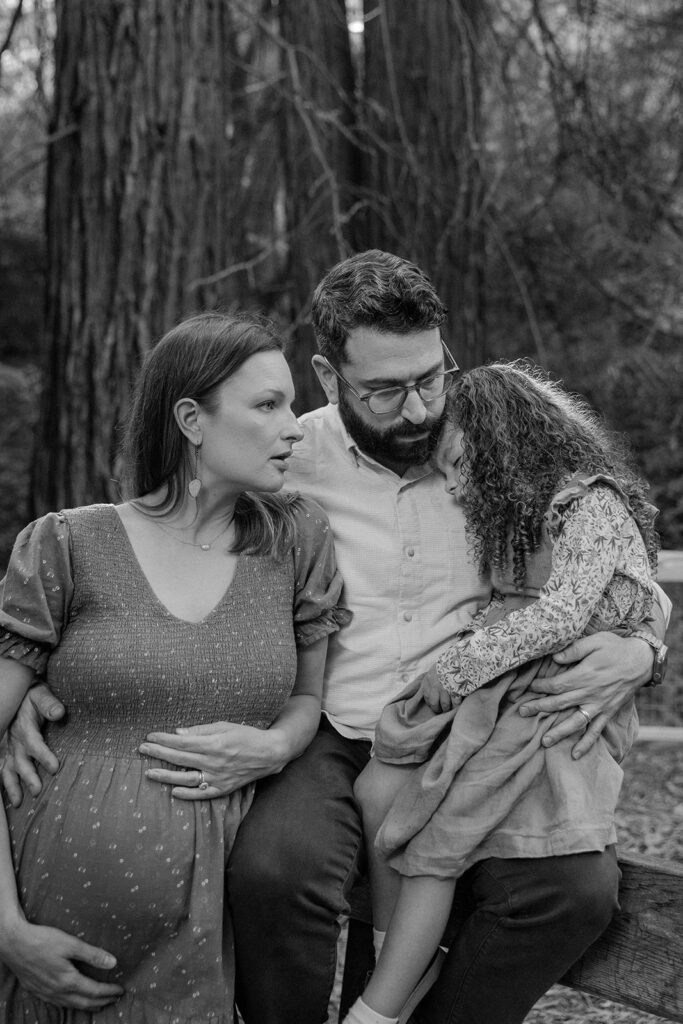 Black and white photo of a family at Tilden Regional Park in Berkeley, CA for their maternity & family pictures