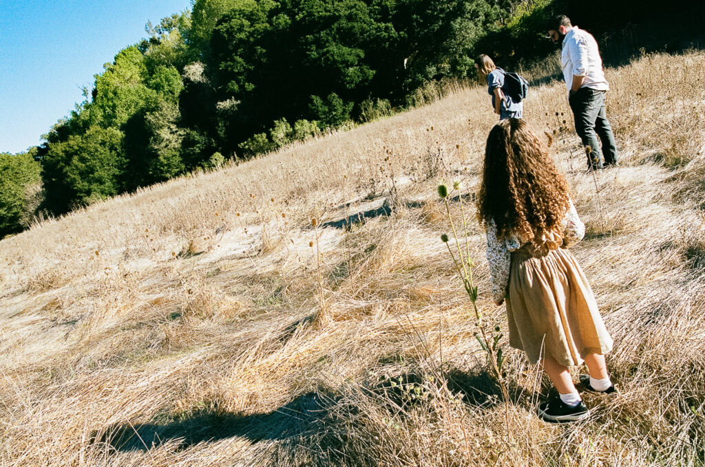 Family of three at Tilden Regional Park in Berkeley, CA for their maternity & family pictures on 35mm film