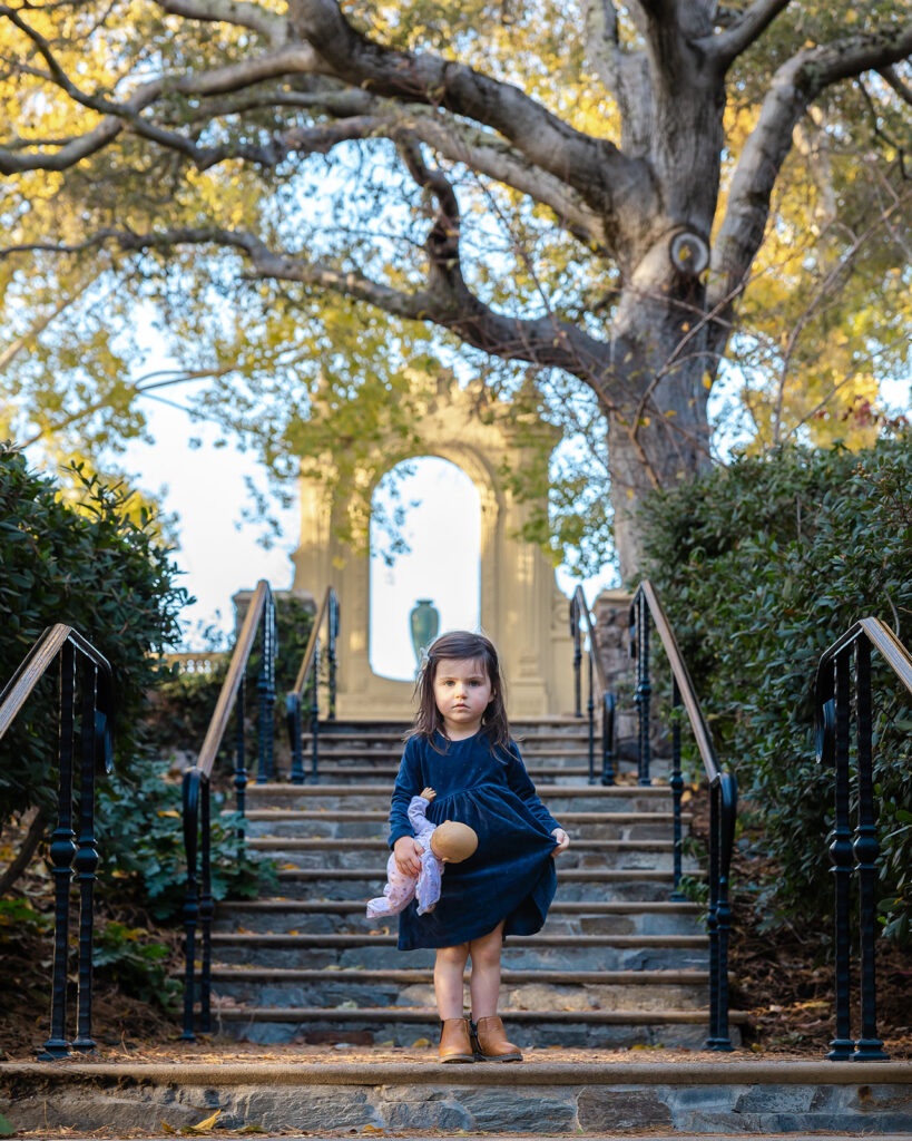 Little girl standing on steps