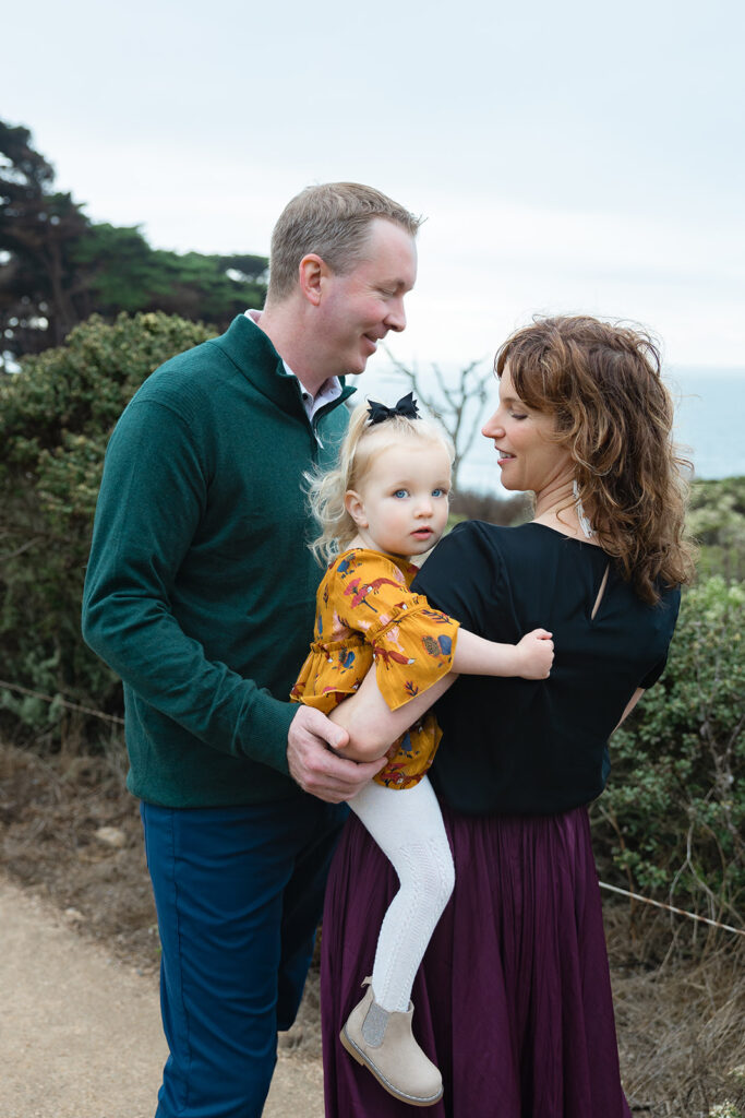 Family of 3's outdoor photos at Lands End in San Francisco