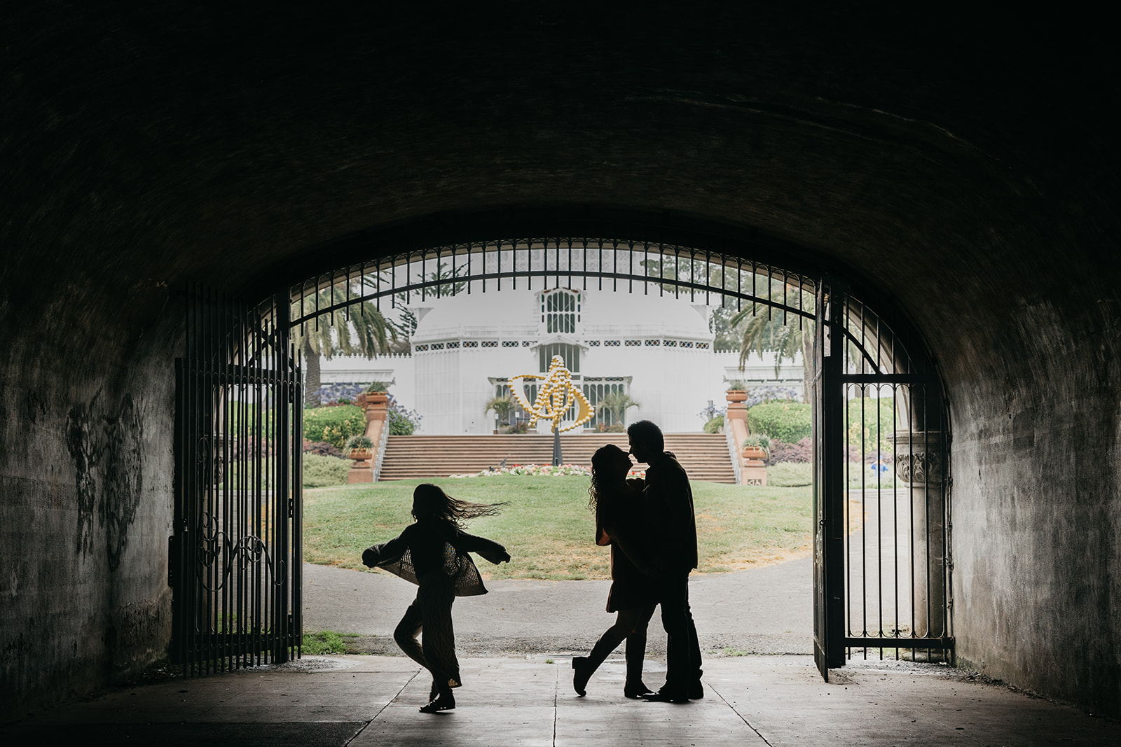Family in a tunnel at Golden Gate Park for their family session. - Top San Francisco Family Photo Locations