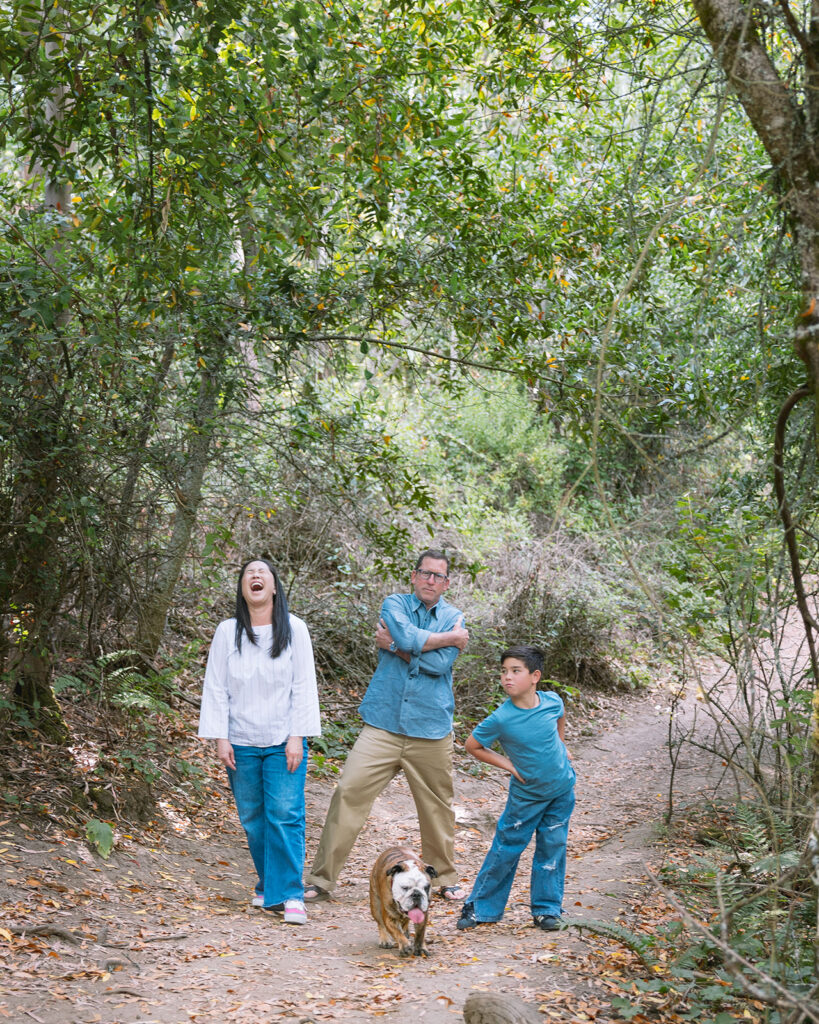 Family making funny poses for their playful and adventurous outdoor Oakland CA family photos at Sibley Regional Park