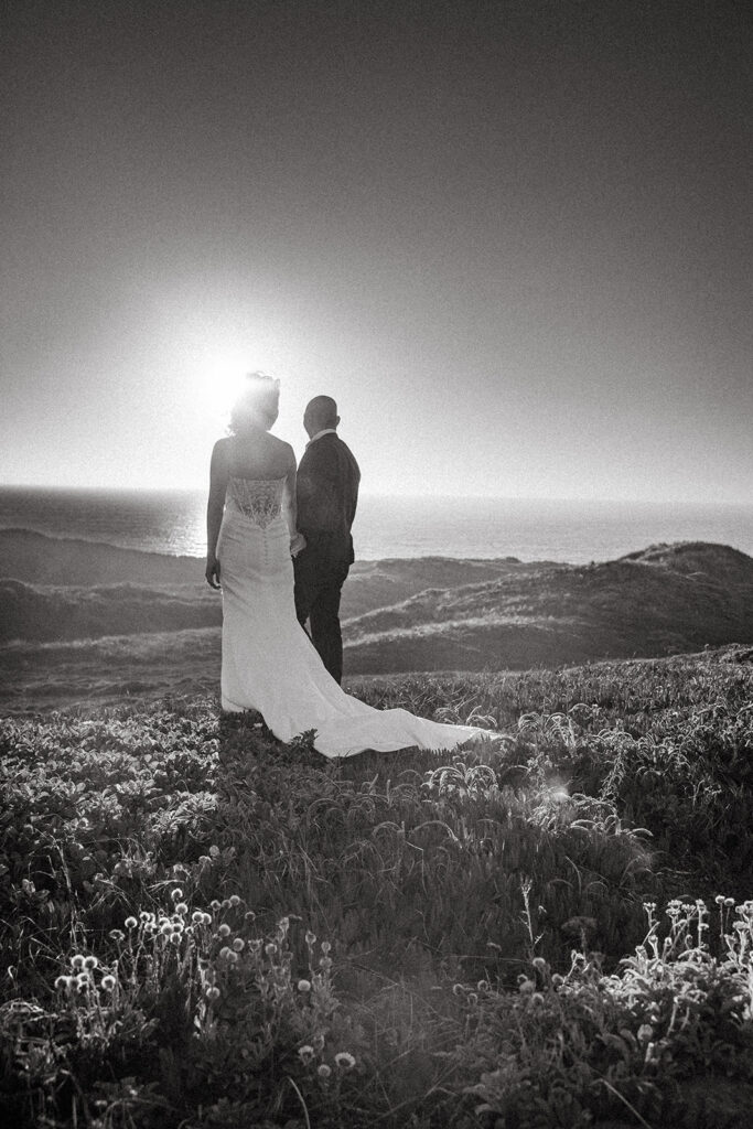 Black and white photo of a couples with ocean views