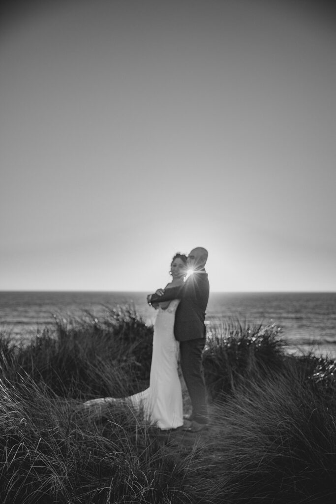 Black and white photo of a couples with ocean views