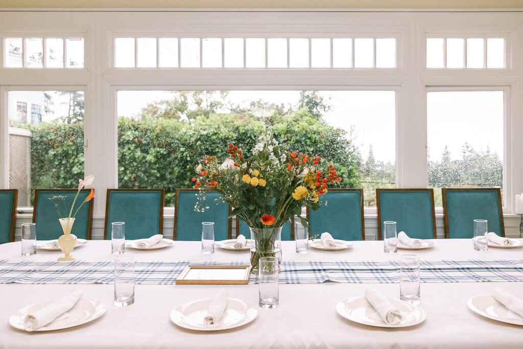 An intimate indoor wedding dinner from an at-home East Bay wedding in Berkeley, California