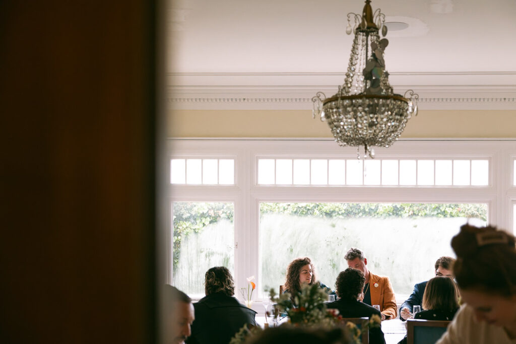 Documentary style wedding photo from an intimate at-home East Bay wedding dinner