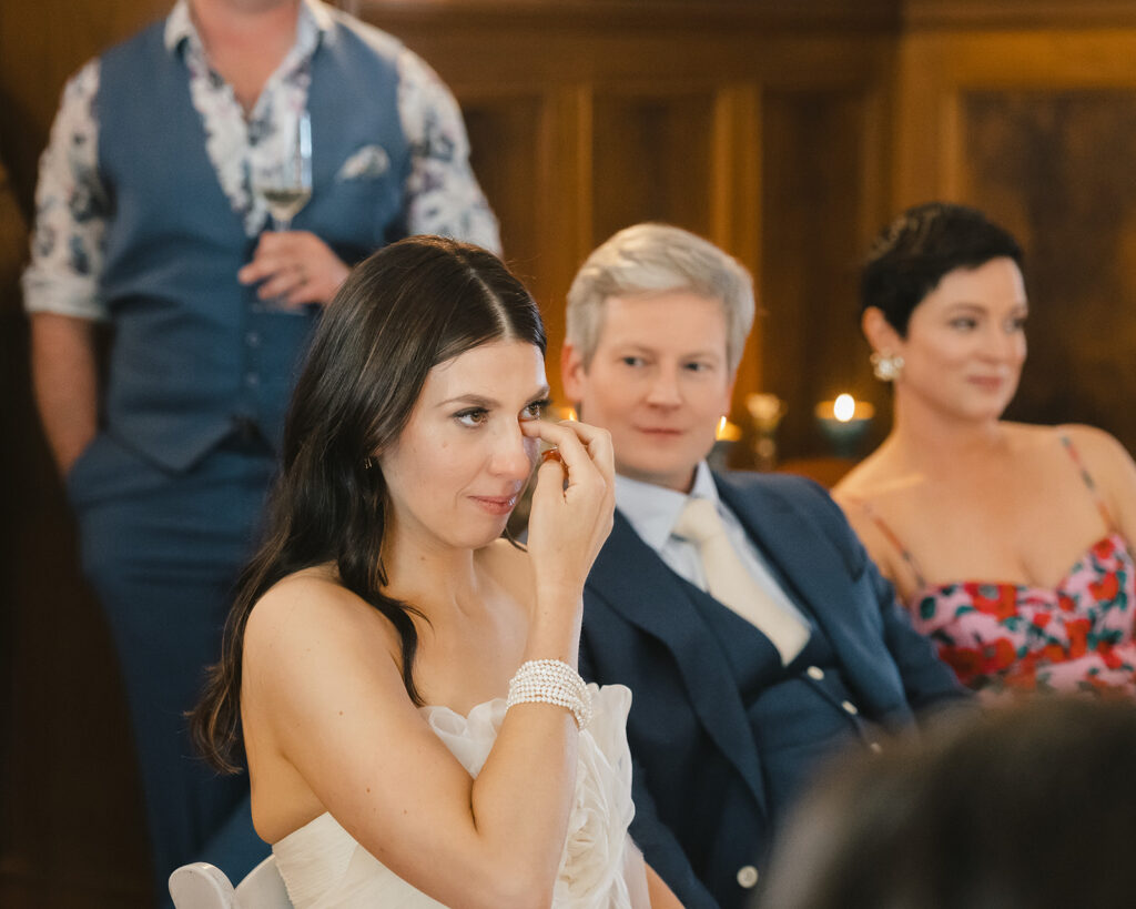 Bride getting emotional during wedding speeches