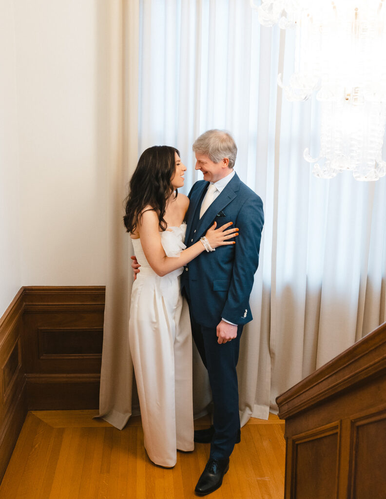 Bride and groom posing for portraits during their at-home East Bay wedding in Berkeley, California