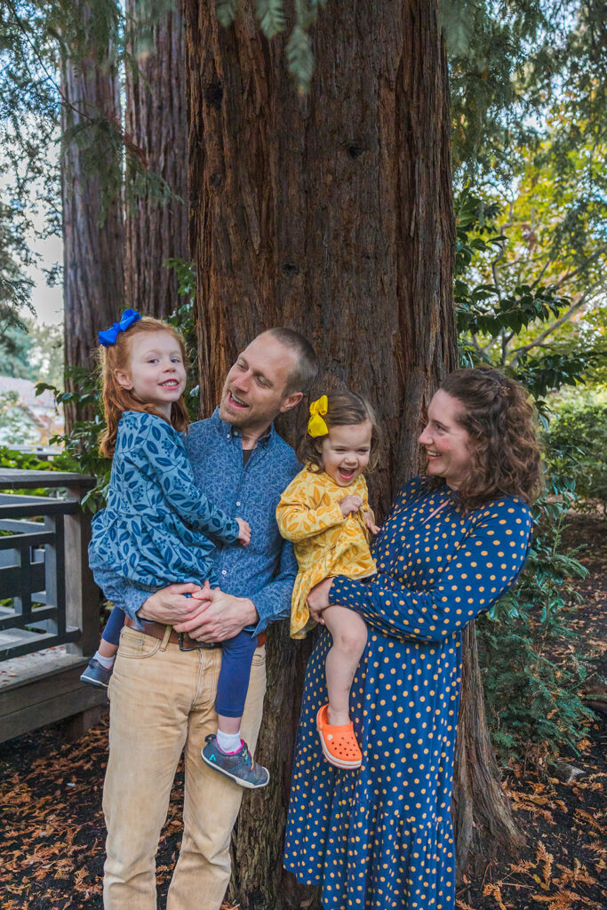 Family of four posing for photos at Piedmont Park in the East Bay of California