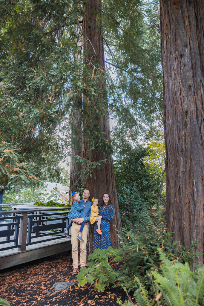 Family posing for photos at Piedmont Park in the East Bay of California 