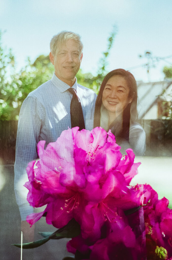 Double exposure photo of a and woman posing for photos in their backyard in San Francisco, California captured on film