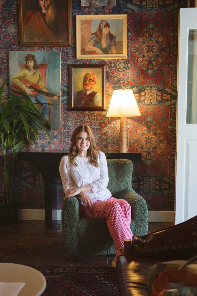 Woman sitting in a green chair