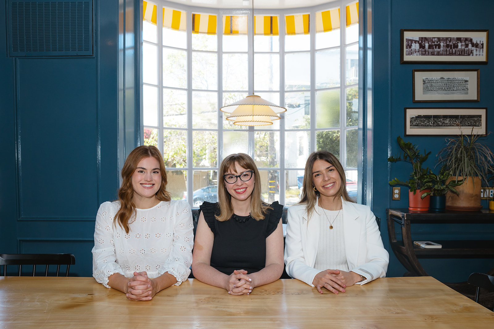 Three women posing for their branding photos at The Graduate Hotel in Berkeley, CA