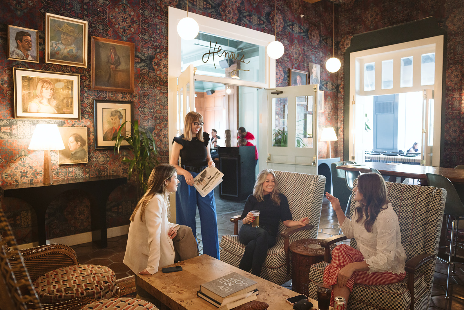 Group of women from Road Scholar posing for their creative brand photoshoot at The Graduate Hotel in Berkeley, California