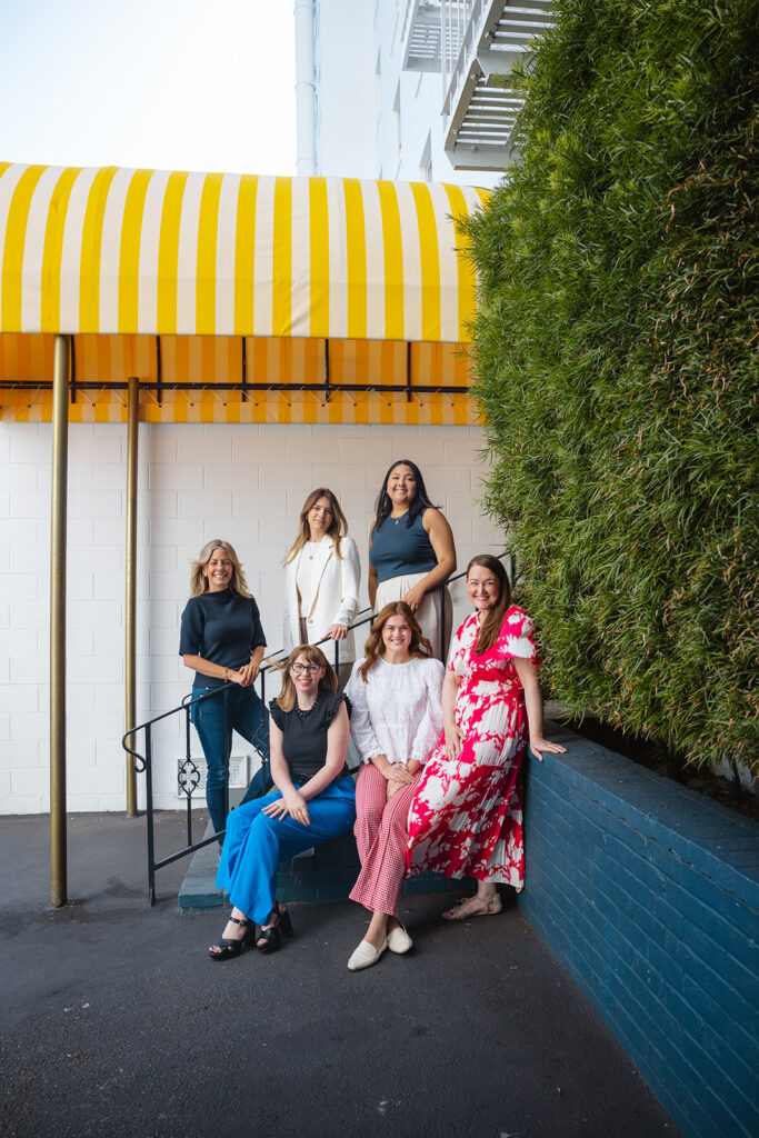 Woman posing on a staircase for their creative Bay Area brand photoshoot in Berkeley, California