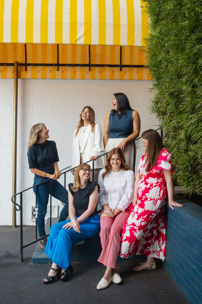 Woman posing on a staircase for their creative Bay Area brand photoshoot in Berkeley, California