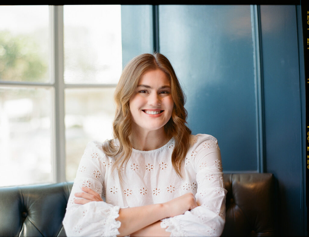 Woman smiling for her brand photoshoot captured on film in the Bay Area