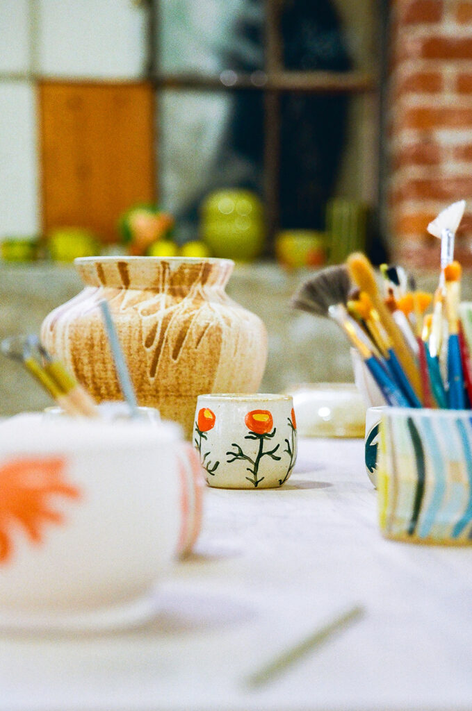 Pottery pieces and paintbrushes captured on film from a creative branding session for The Pottery Studio San Francisco