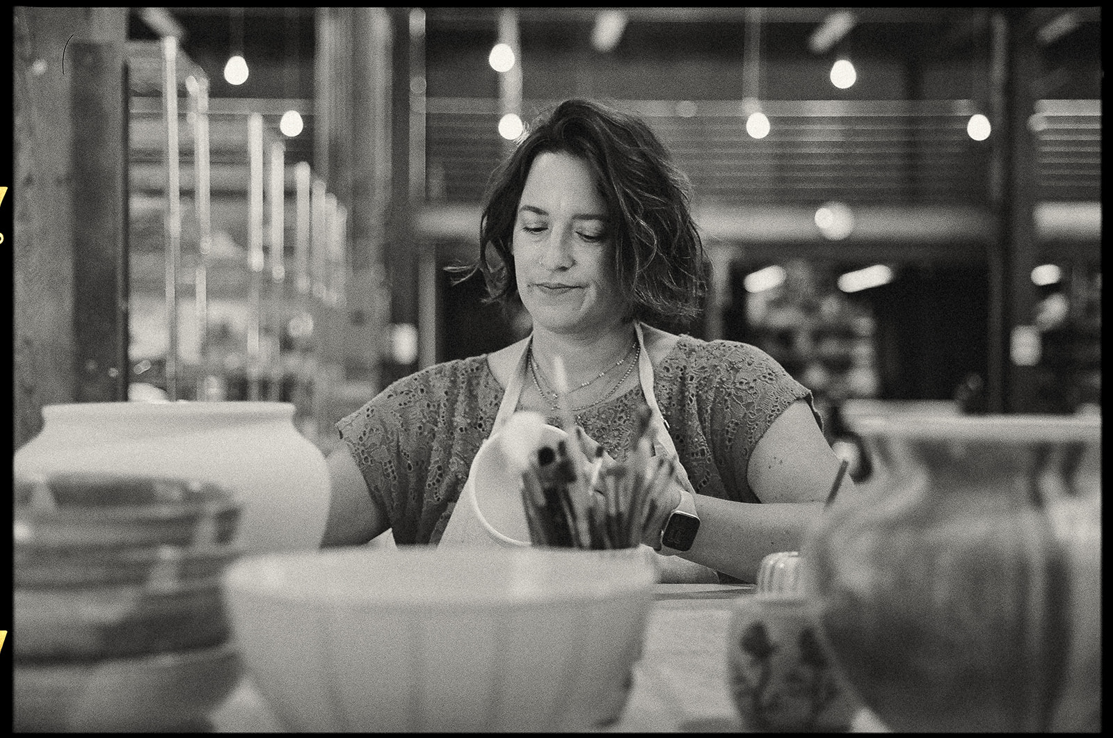 Black and white film photo of a ceramic artists creative branding session for The Pottery Studio San Francisco