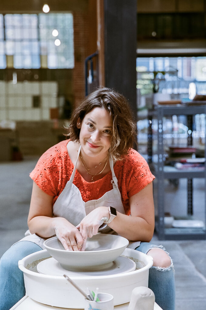 Woman doing pottery for her creative film branding session for The Pottery Studio in San Francisco