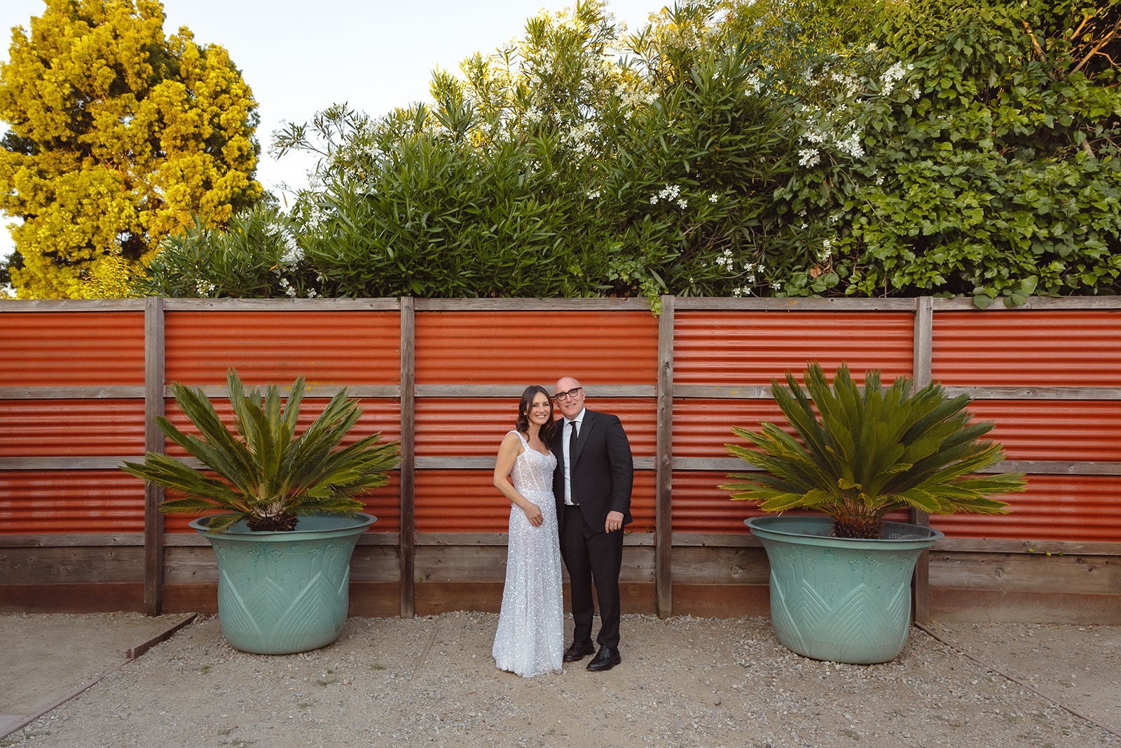 Outdoor bride and grooms portraits at Pizzaiolo in Oakland, California