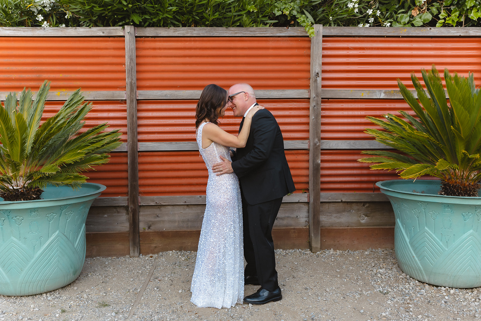 Bride and grooms wedding portraits outside of Pizzaiolo in Oakland, California