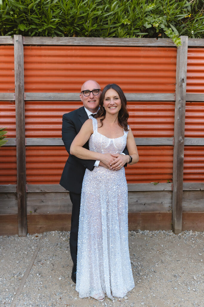 Bride and grooms wedding portraits outside of Pizzaiolo in Oakland, California