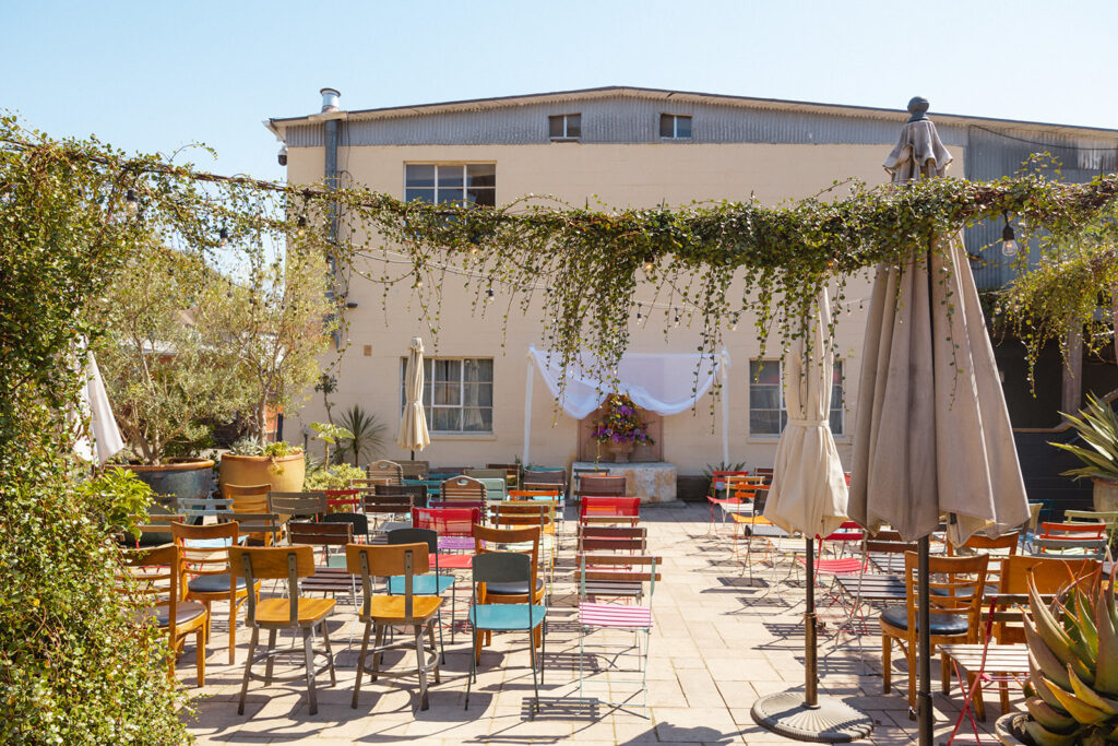 An outdoor Pizziaolo wedding ceremony in Oakland, California