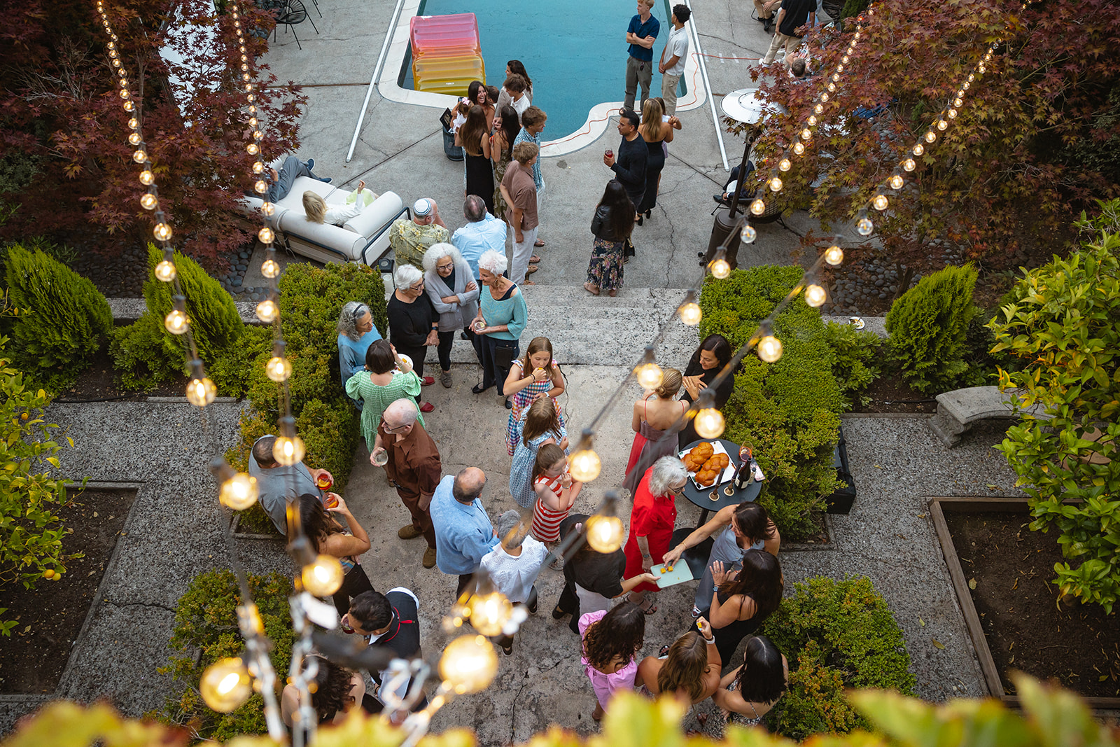 Guests mingling during a Berkeley welcome wedding gathering