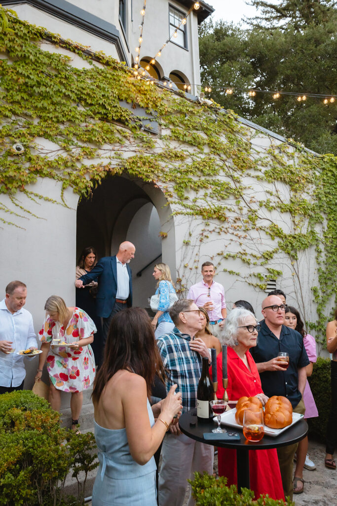 Guests mingling during a Berkeley welcome wedding gathering