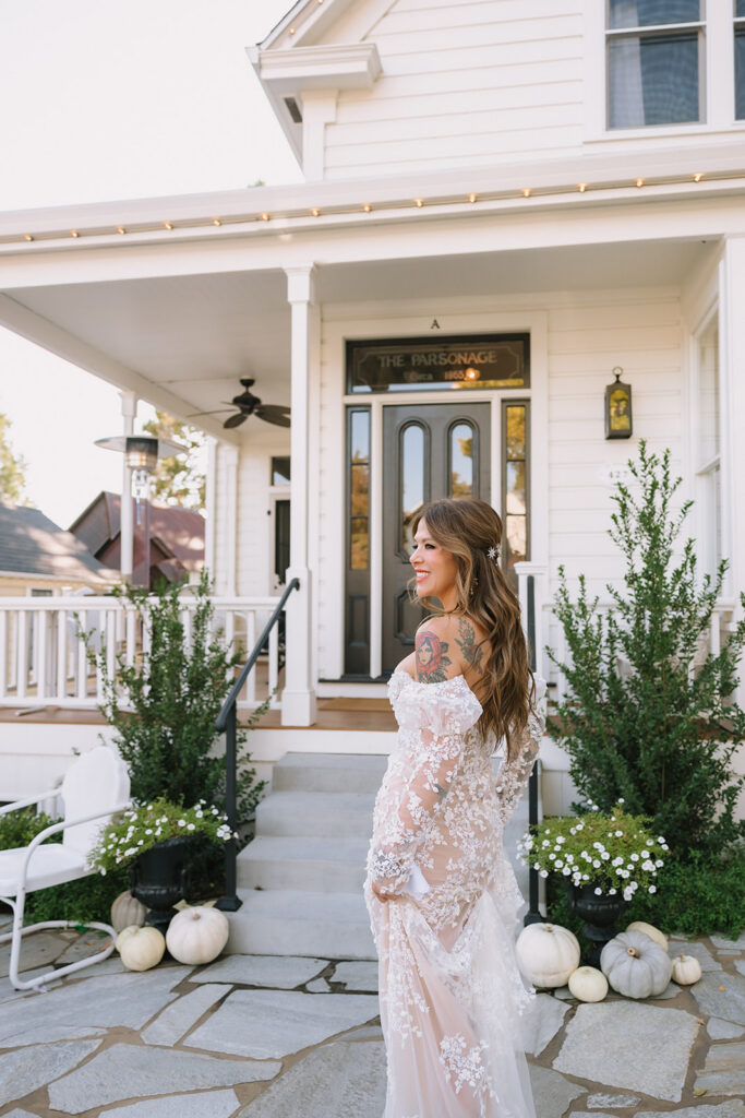 Bride outside of The Parsonage 1865 during Miners Foundry wedding in Nevada City, California.