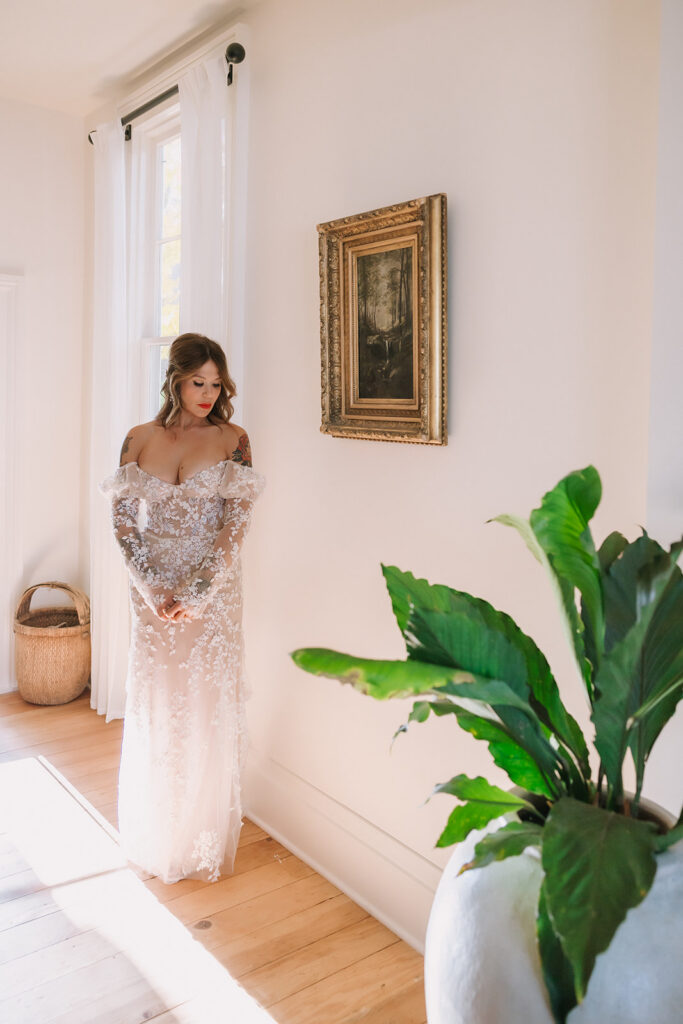 Bride posing inside The Parsonage 1865 during Miners Foundry wedding in Nevada City, California.
