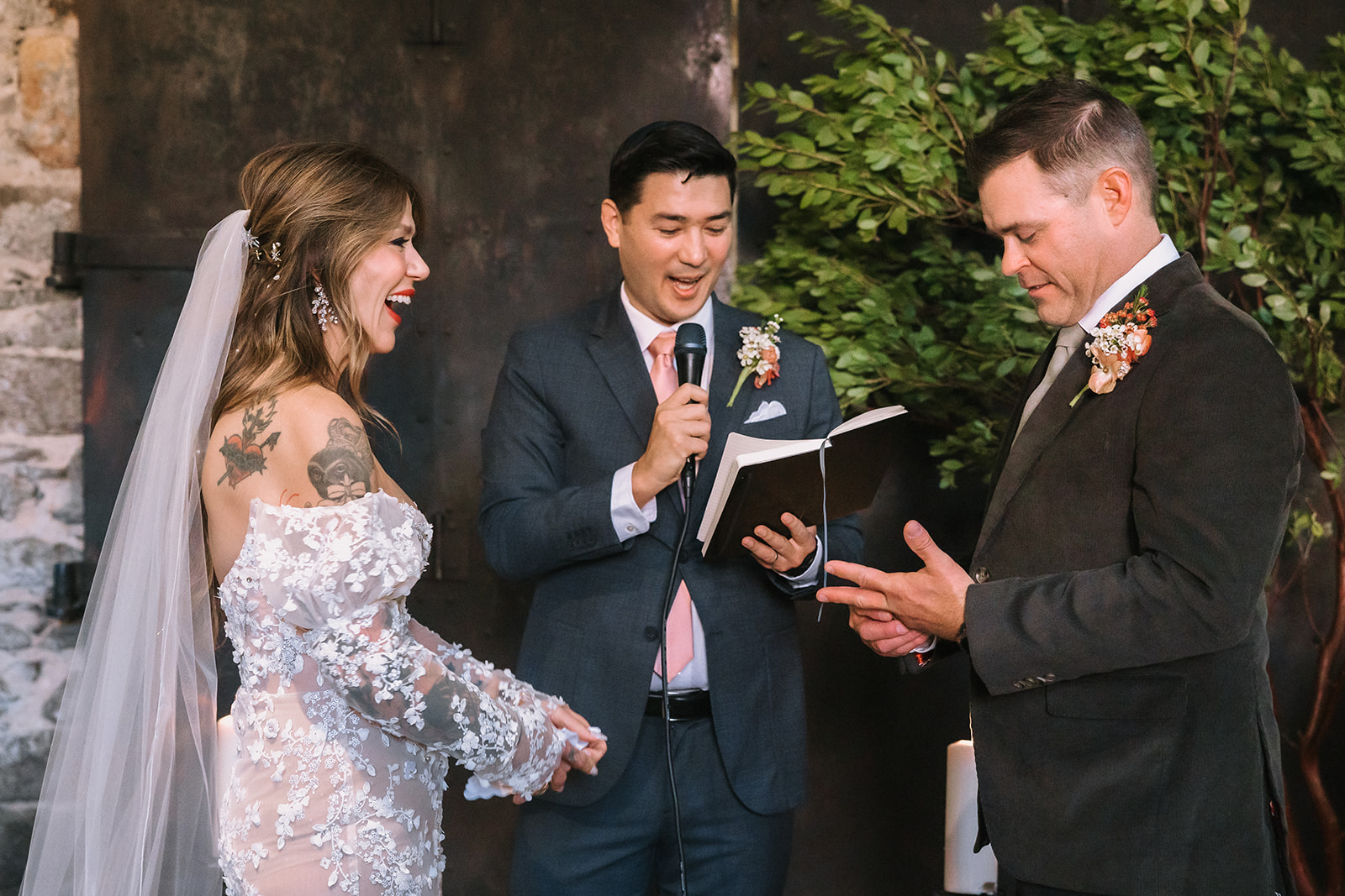 Officiant reading ceremony during a Miners Foundry wedding in Nevada City, California.