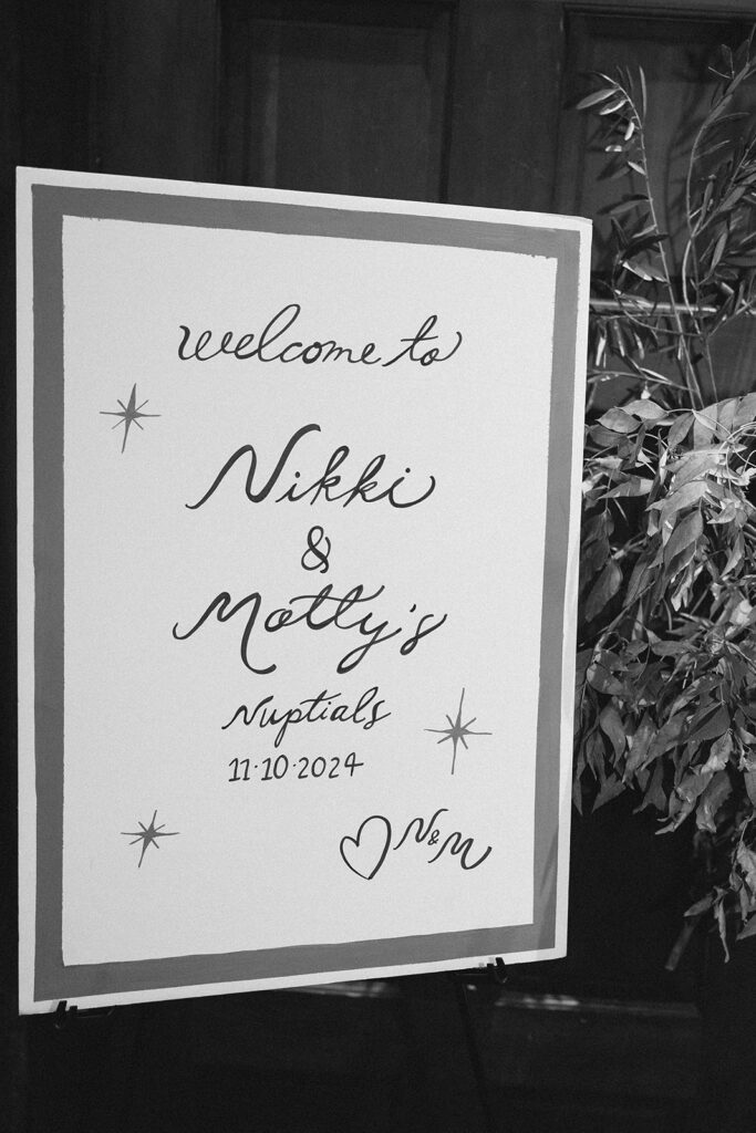 Welcome sign reading Nikki and Matty’s nuptials at Miners Foundry wedding in Nevada City, California.
