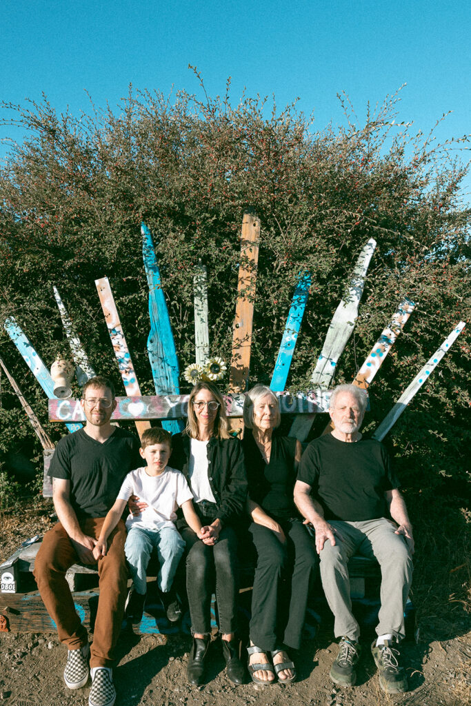 Three generation family photo with an art installation at Albany Bulb in the East Bay. 
