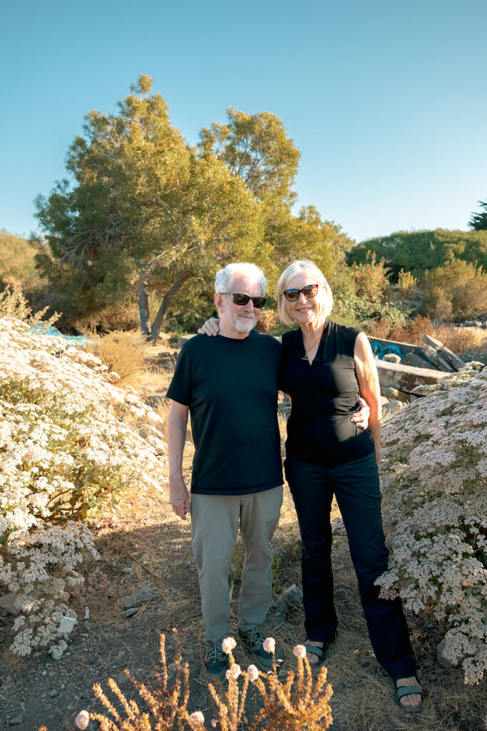 Couple posing together for a photo. 
