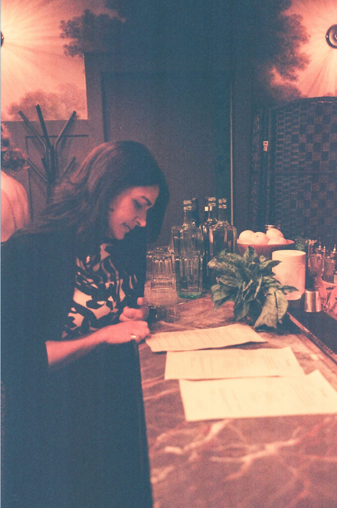 Guest looking over the menu at Fiorella in SF.