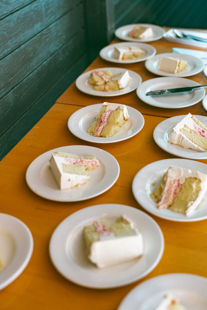 Wedding cake slices cut for guests for a  San Francisco micro wedding reception at Fiorella.